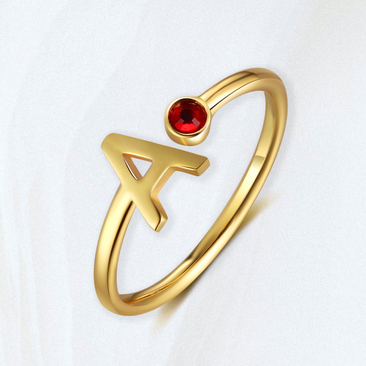 gold initial birthstone ring
